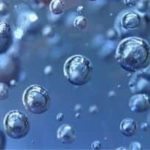 Transparent bubbles of varying sizes on a blue background, illustrating plumbing air issues from Force Plumbing.
