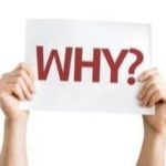 Hands holding a sign saying "WHY?" in red, symbolizing inquiries about noisy plumbing by Force Plumbing and Heating.